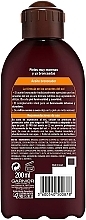 Intensive Tanning Oil with Coconut Scent - Garnier Delial Ambre Solaire Intense Suntan Coco Oil — photo N7