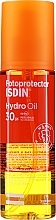 Sun-protecting 2Phase Body Oil - Isdin Fotoprotector Hydro Oil SPF 30+ — photo N1