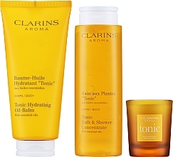 Set - Clarins Aroma Ritual Collection (show/conc/200ml+b/balm/200ml+candle/35g+cosmetic bag/1pc) — photo N3