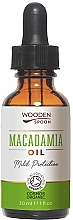 Macadamia Oil - Wooden Spoon Macadamia Oil — photo N1