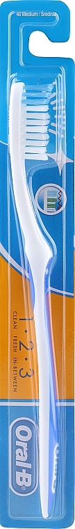 Toothbrush, 40 medium, blue - Oral-B 1 2 3 Delicate White 40 Medium — photo N1