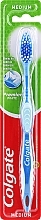 Medium Premier Toothbrush #1, blue 2 - Colgate Premier Medium Toothbrush — photo N1