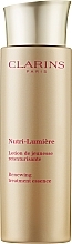 Renewing Facial Lotion - Clarins Nutri-Lumiere Renewing Treatment Essence — photo N1