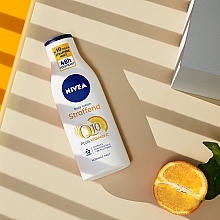 Moisturizing Lotion Q10 plus for Skin Elasticity - NIVEA Q10 PLUS Body Lotion — photo N4