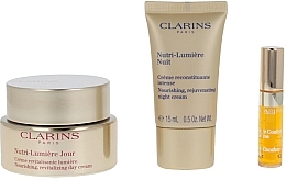 Set - Clarins Nutri-Lumiere Set (day/cr/50ml + night/cr/15ml + lip/oil/2.8ml) — photo N2