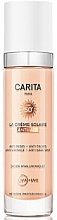 Fragrances, Perfumes, Cosmetics Facial Sunscreen SPF50+ - Carita Progressif Anti-Age Solaire Le Creme Solaire Anti-Age SPF50+ 