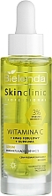Fragrances, Perfumes, Cosmetics Brightening & Nourishing Face Serum with Vitamin C - Bielenda Skin Clinic Professional