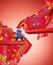 GIFT! Patterned Red Makeup Bag with Cosmetics - Estee Lauder (foam/30ml + serum/7ml + conc/5ml + bag) — photo N1