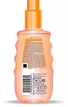 Sunscreen Spray - Garnier Delial Ambre Solaire Invisible Protect Glow SPF30 Spray — photo N2