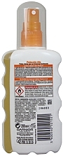 Sunscreen Spray - Garnier Delial Ambre Solaire Clear Protect Transparent Protective Spray SPF30 — photo N2