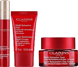 Set - Clarins VP Super Restorative HLY 2022 (cr/50ml + cr/15ml + serum/10ml + bag/1pc) — photo N2