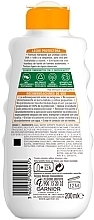 Sunscreen Milk SPF 20 - Garnier Ambre Solaire Waterproof Protection Lotion SPF 20 — photo N2