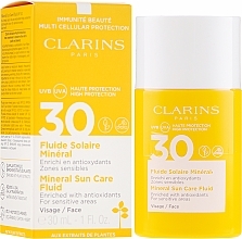 Fragrances, Perfumes, Cosmetics Sunscreen Facial Fluid - Clarins Fluide Solaire Mineral Visage SPF 30