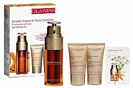 Set - Clarins Double Serum & Nutri-Lumiere (ser/50 ml + cr/2x15 ml + eye ser/0.9 ml) — photo N1