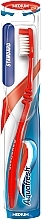 Fragrances, Perfumes, Cosmetics Medium Hard Toothbrush, red - Aquafresh Standard Medium