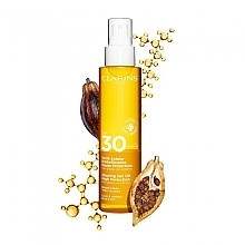 Sunscreen Body Oil - Clarins Glowing Sun Oil High Protection SPF 30 — photo N2