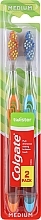 Twister Toothbrush, medium, orange+blue - Colgate Twister Medium — photo N1