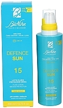 Sunscreen Body Lotion - BioNike Defence Sun SPF15 Fluid Lotion Water Resistant — photo N2