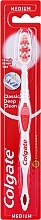 Classic Health Toothbrush, medium, red 2 - Colgate — photo N1